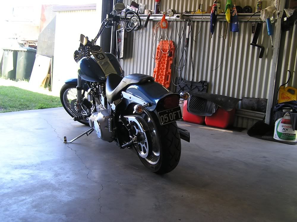 http://i867.photobucket.com/albums/ab240/bomber_watson/harley/lowering3.jpg