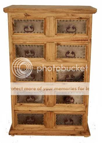 Five drawer chest with cowhide upholstery and nail head trim.